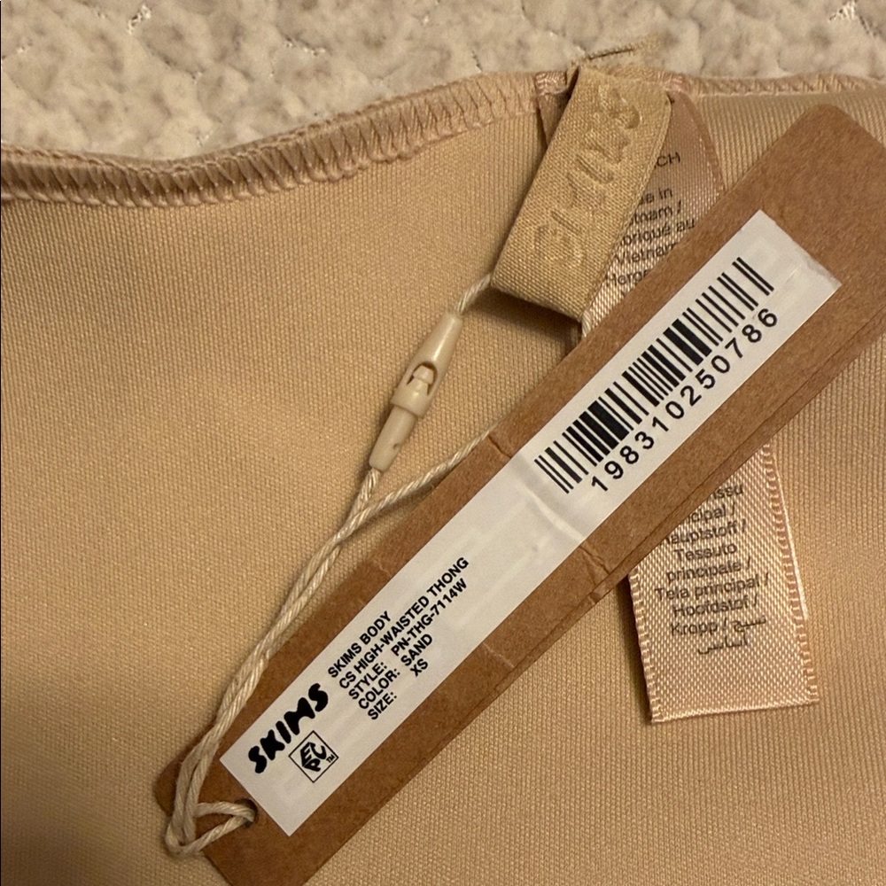 SKIMS Sculpt High-Waist Thong ULTRA STRONG support. SAND - Picture 14 of 14